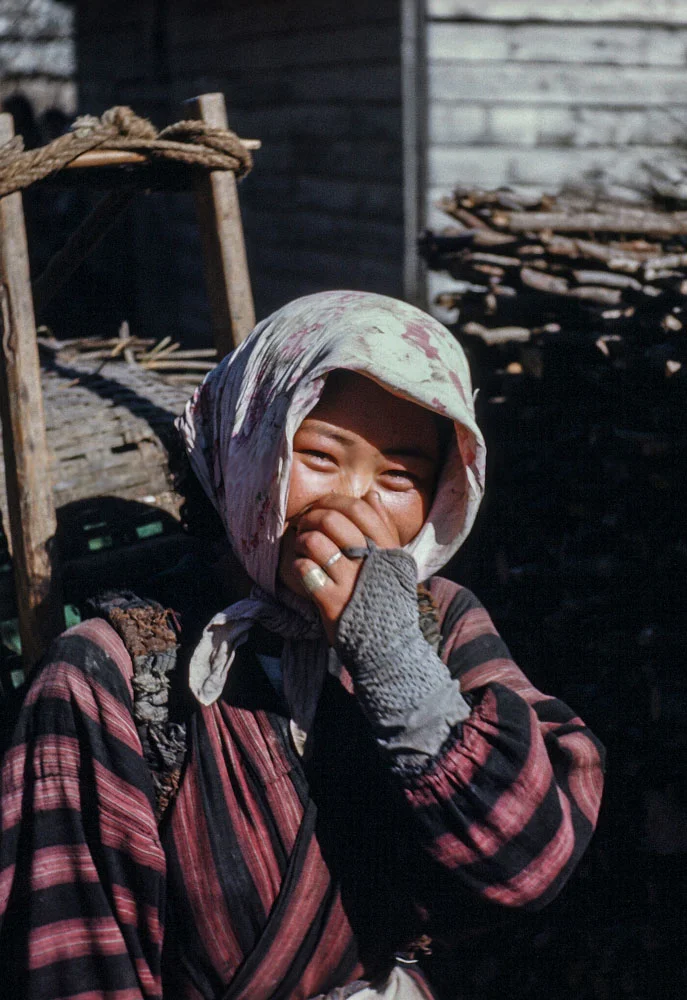 111 Woman Carrying Pack
