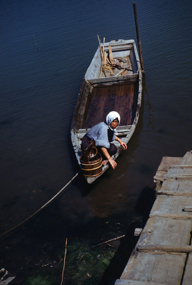 36a- Woman in Boat