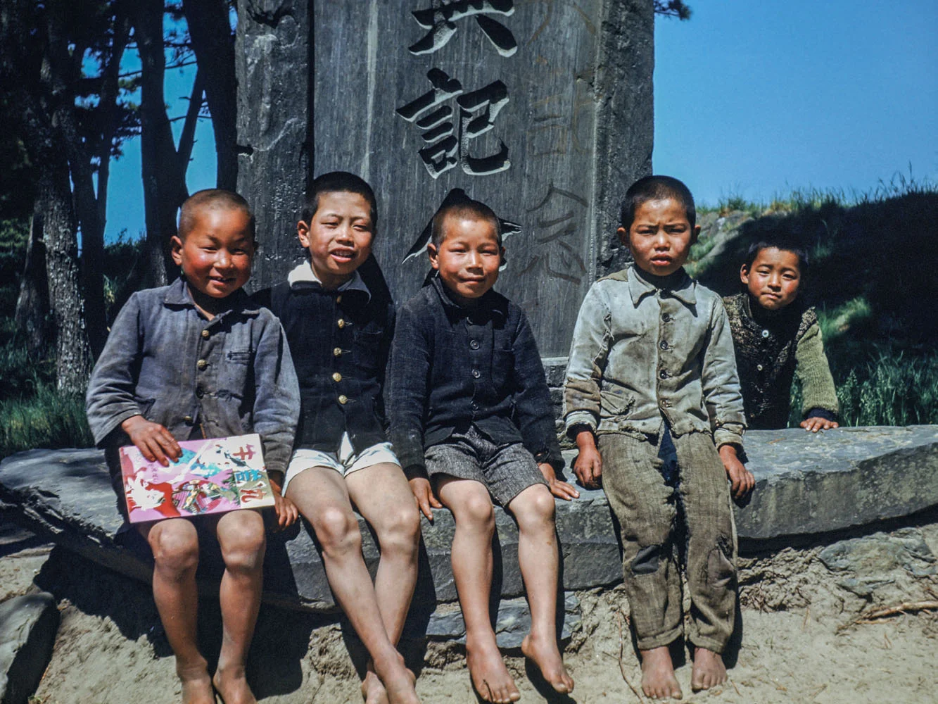 341-Five Boys Sitting at base of Monument