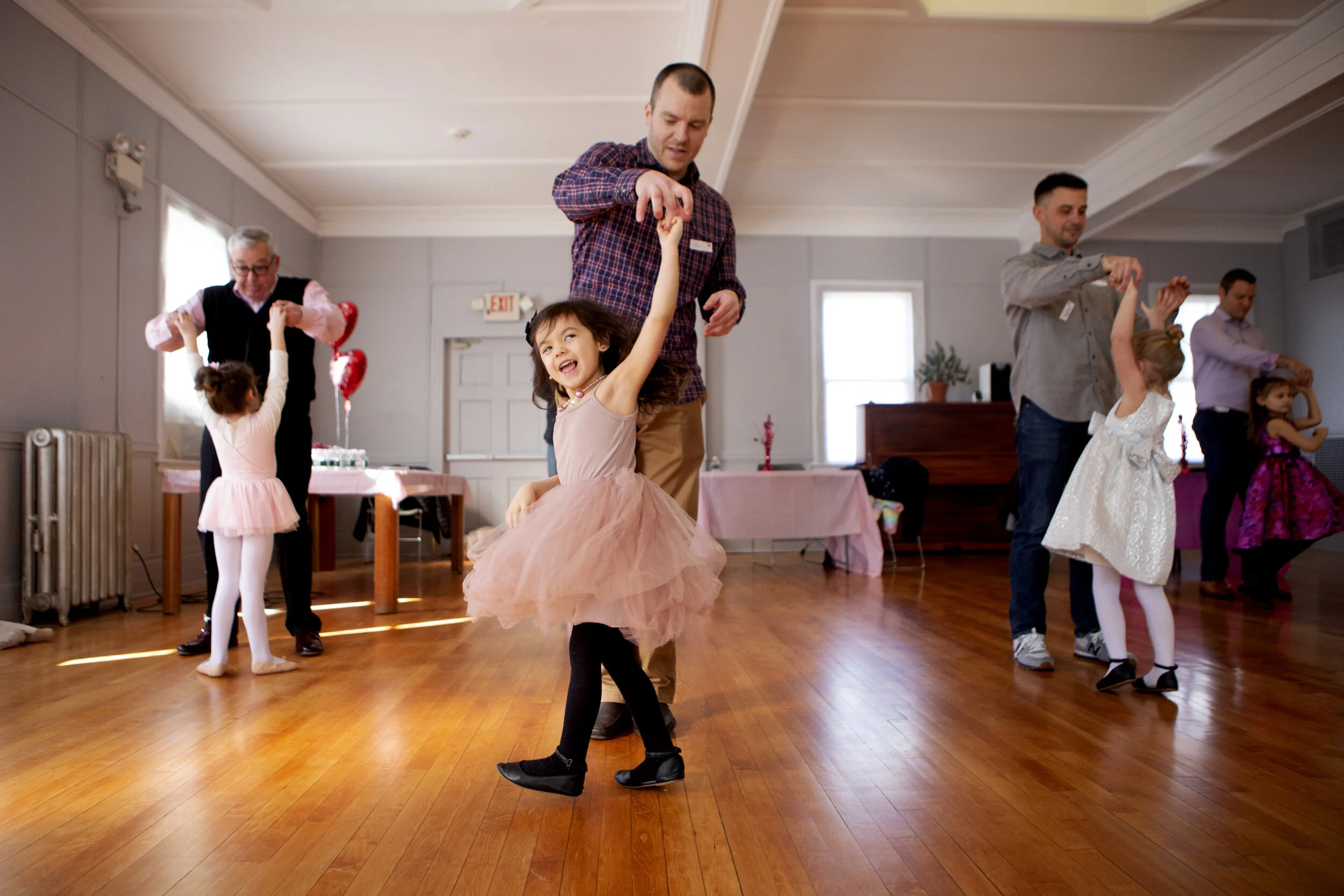 Kevin Bransfield twirls his daughter, Emma, 3, during a father daughter dance class on Feb. 8 in Swampscott, MA.