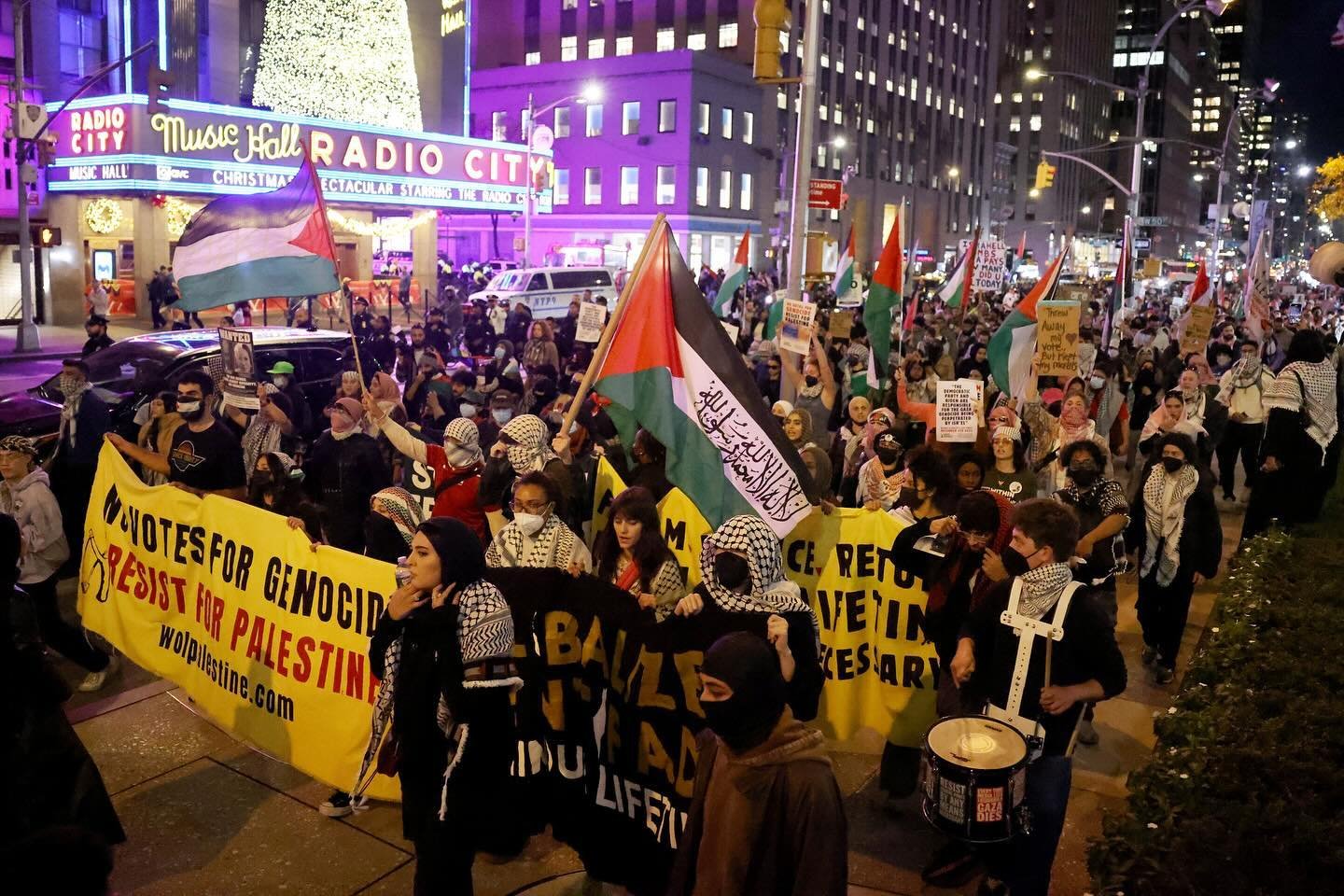 Pro-Palestinian protesters march through Rockefeller Center and Times Square on election night