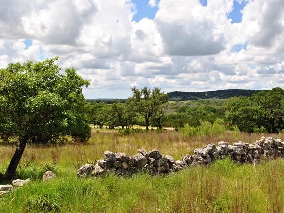 The rolling land of Cooolwater Ranch's Texas Hill Country