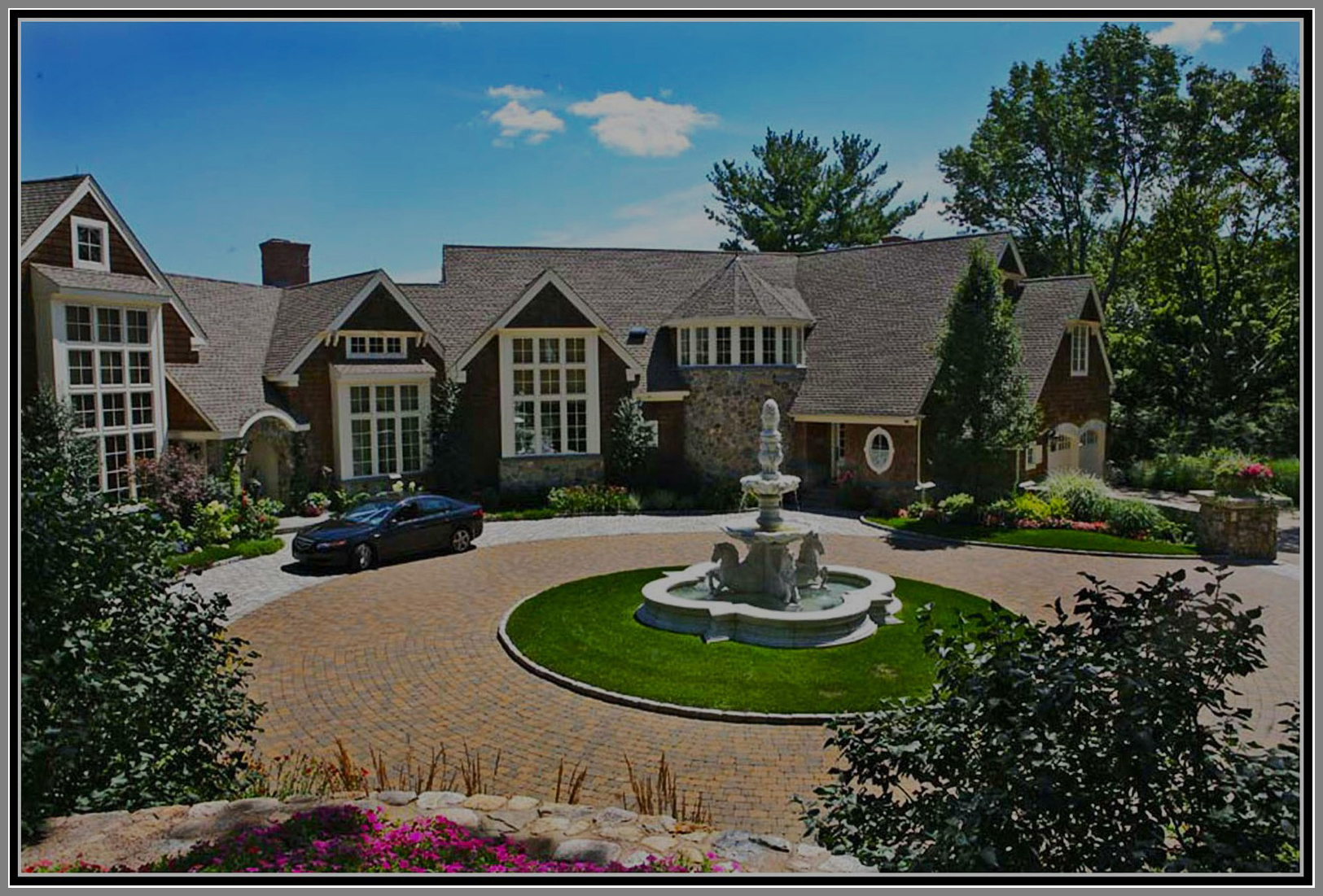 Courtyard with marble fountain by Artistic Outdoors