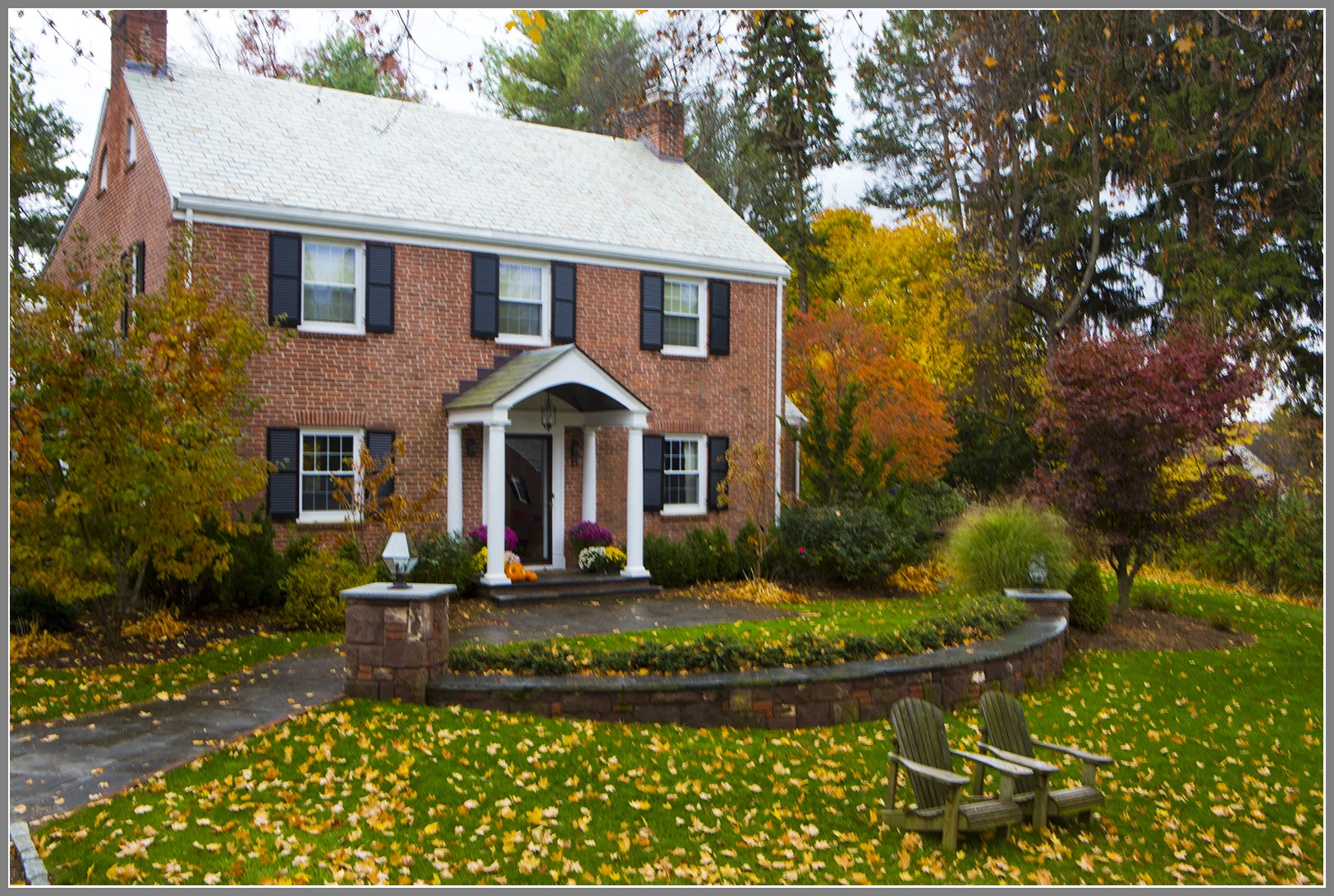 Front walk- entrance courtyard with column and wall