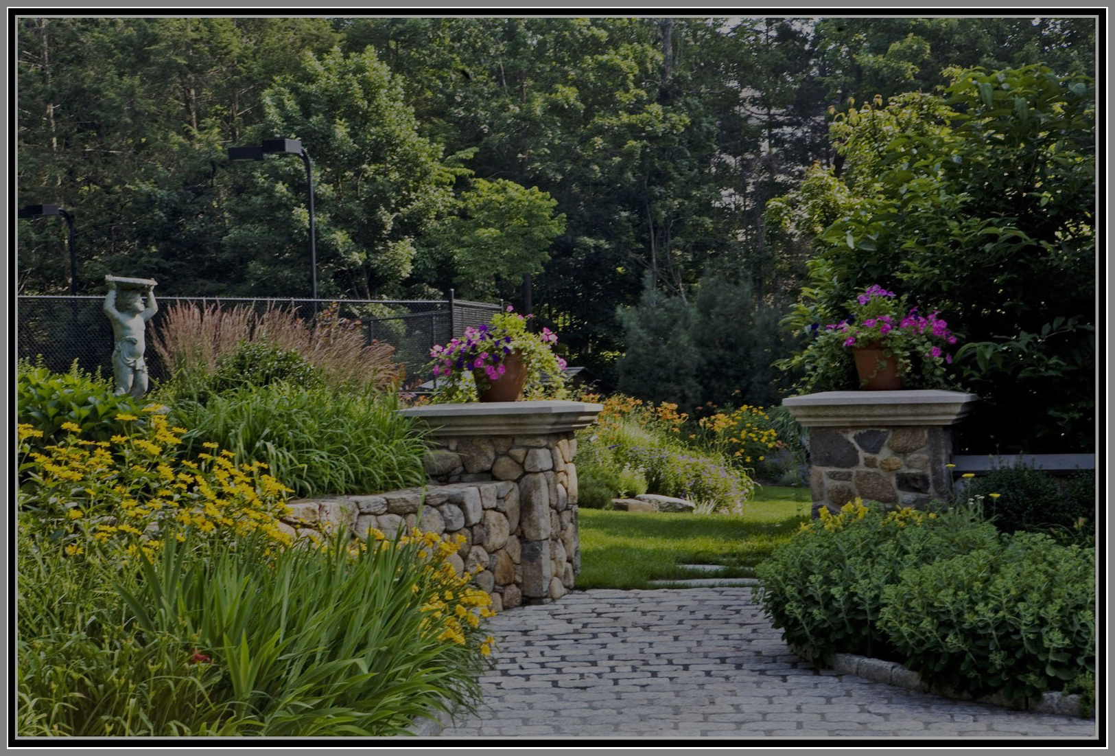 Garden with Urns/ ornaments by Artistic Outdoors