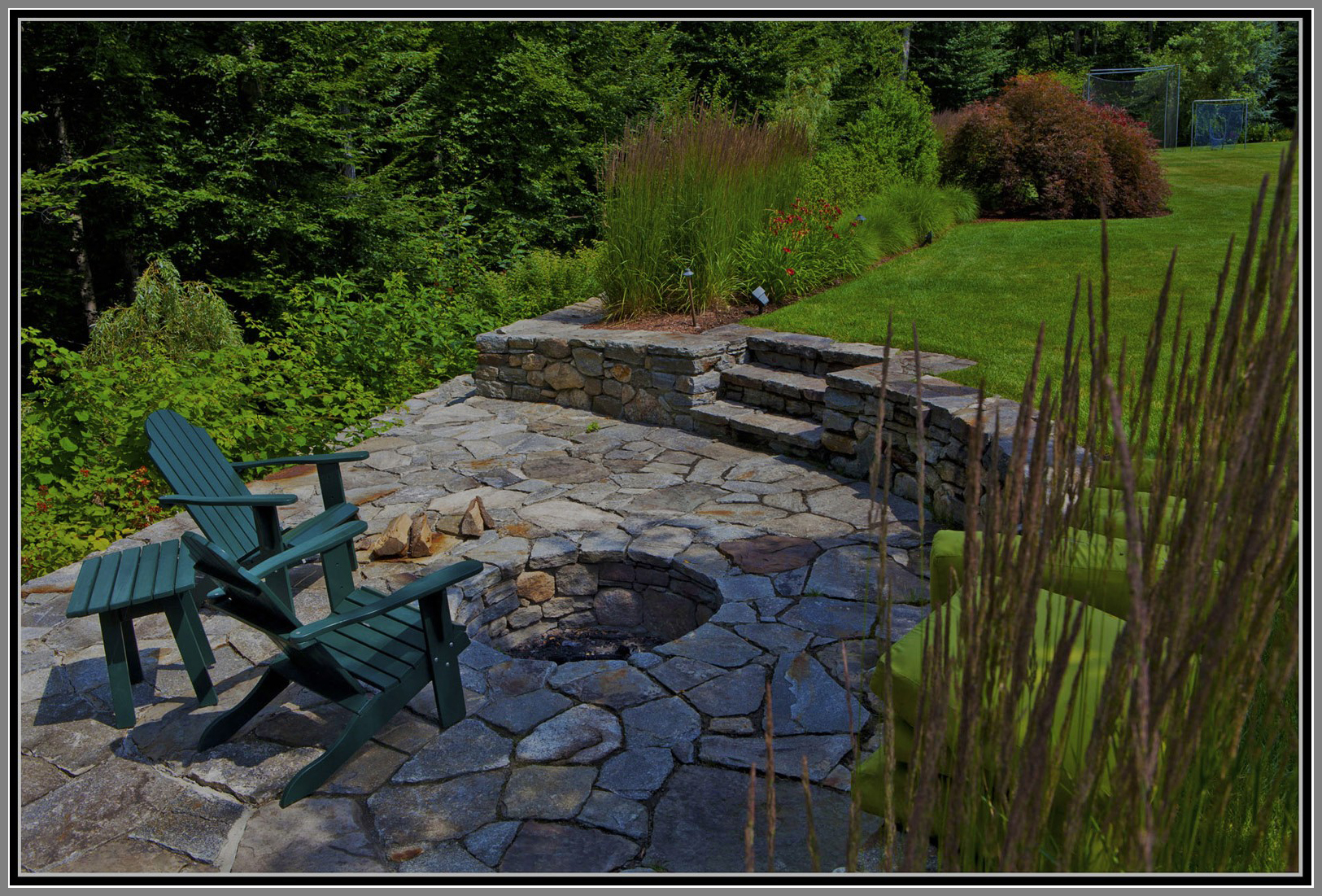 Inground stone fire pit by Artistic Ourtdoors