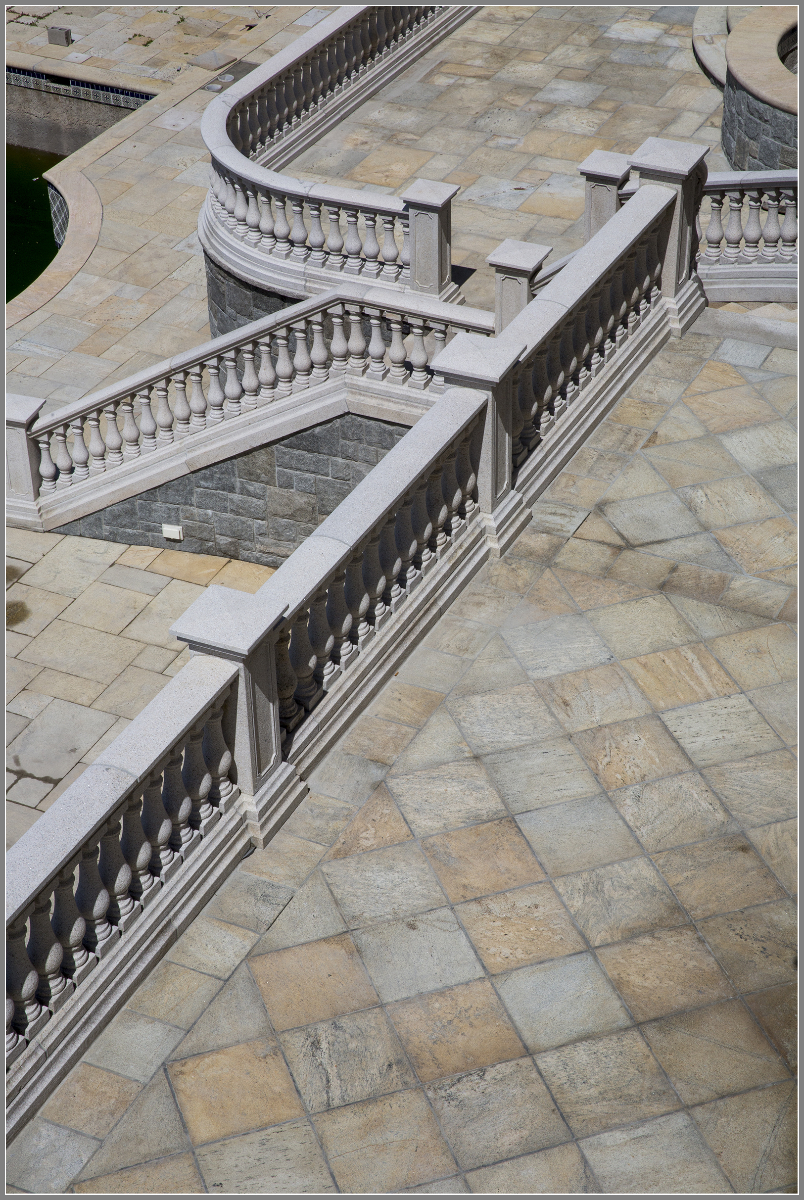 Granite balustrade system and patio