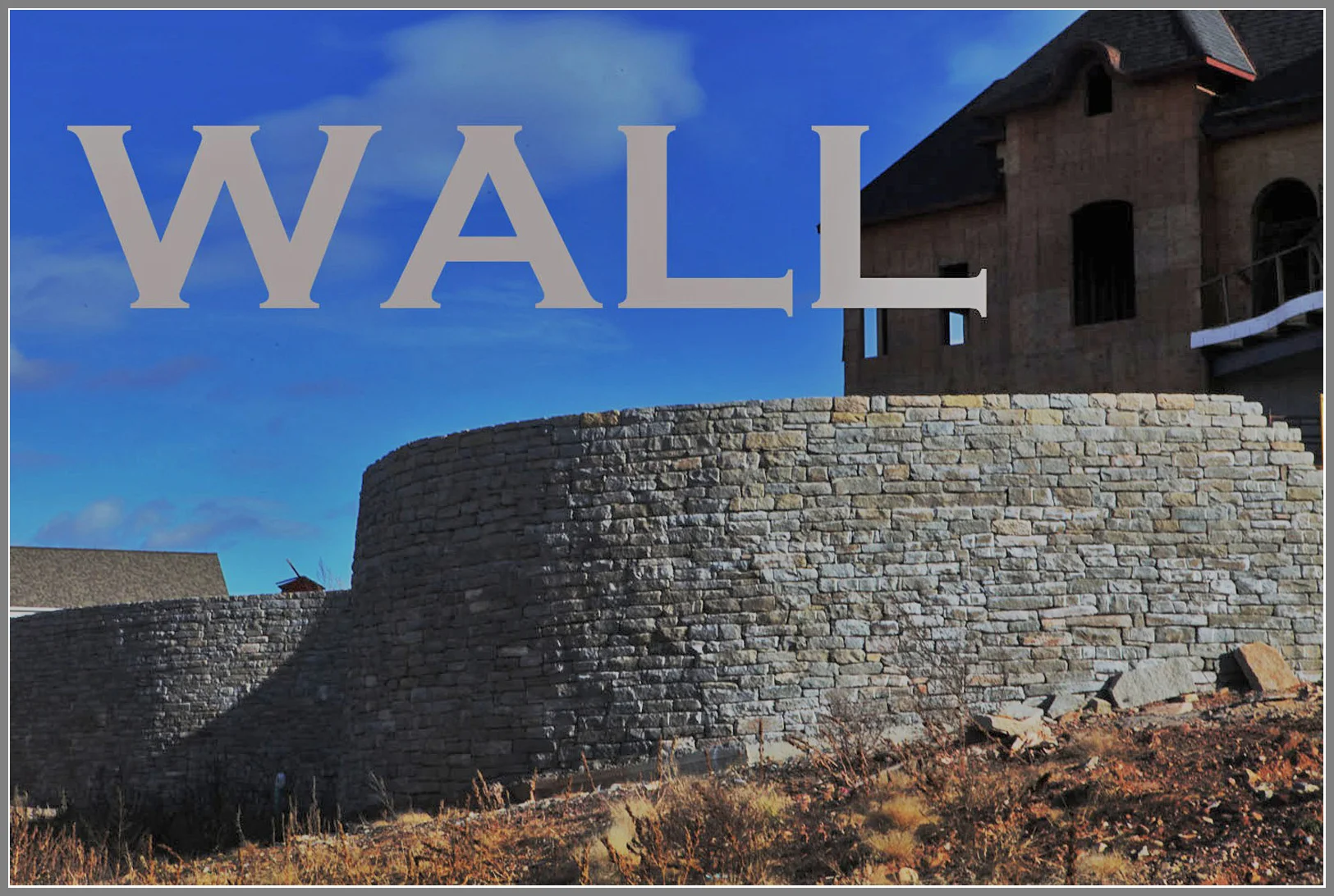Stone wall by Artistic Outdoors
