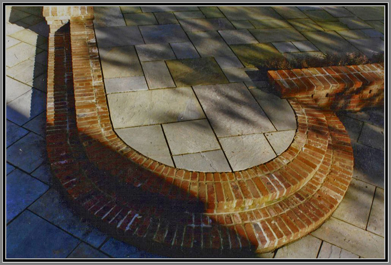 Blue stone patio and brick steps