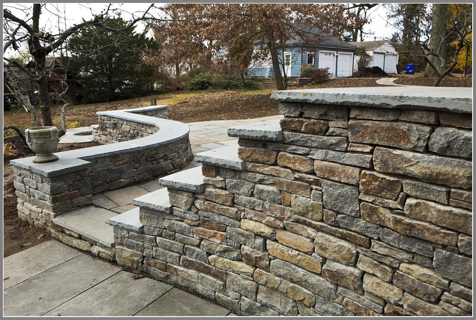 Stone sitting wall, stoop and steps