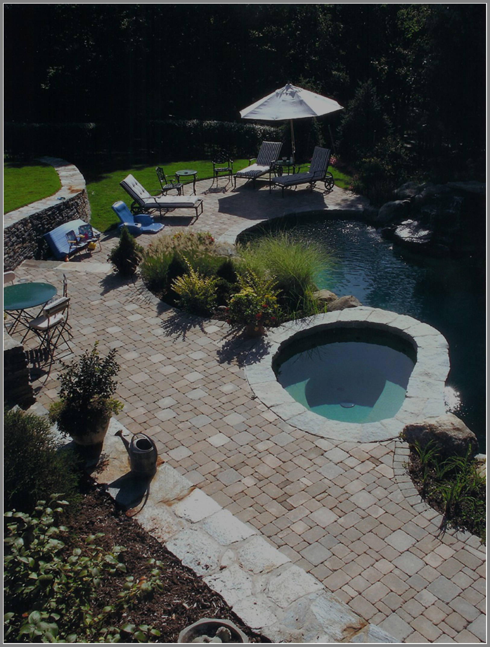 Concrete paver pool deck by Artistic outdoors