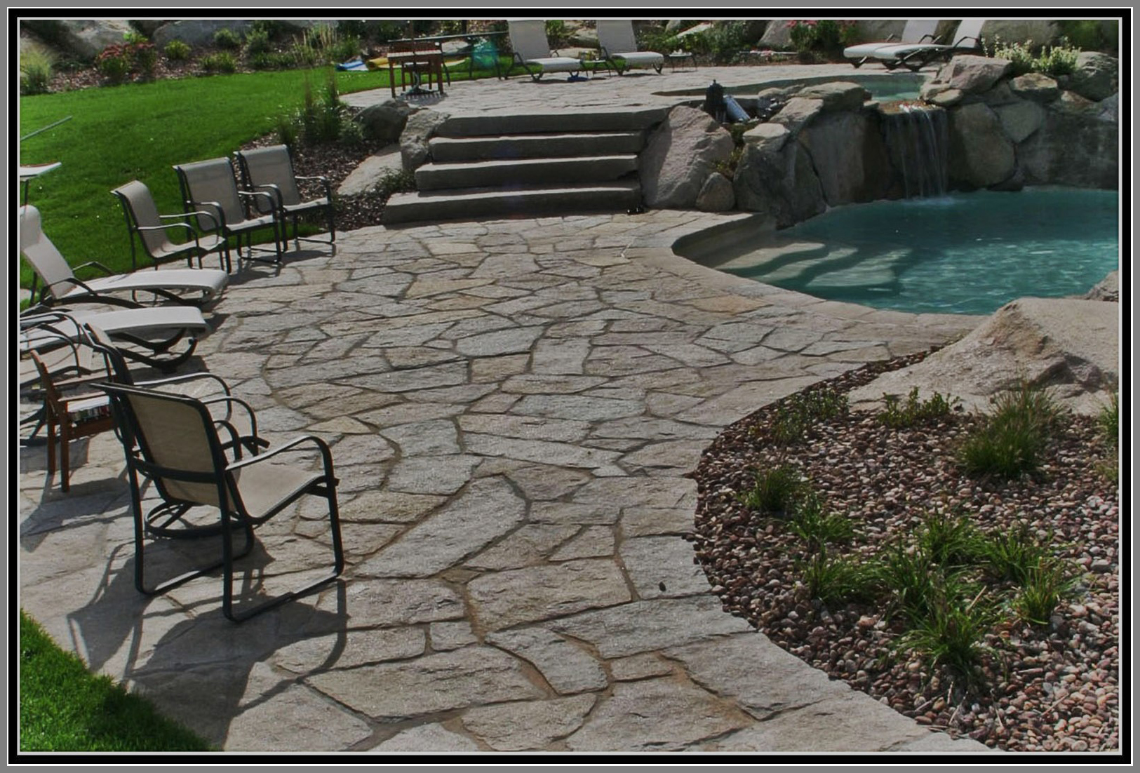 Flag stone granite patio and pool deck