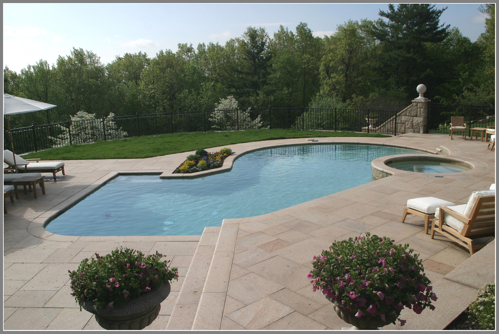 Chinese granite pool deck by Artistic Outdoors