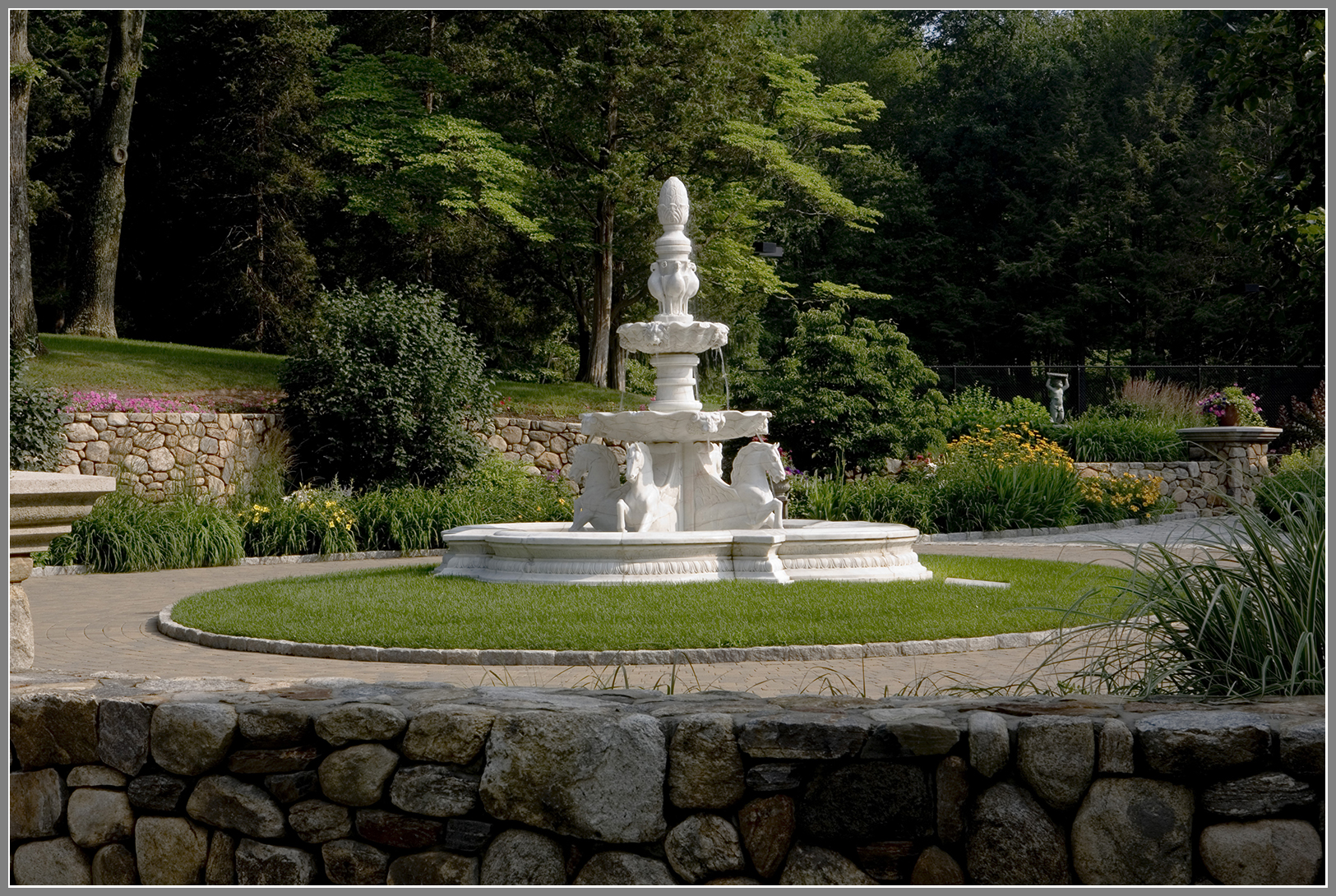 Marble fountain and pool surround by Artistic Outdoors