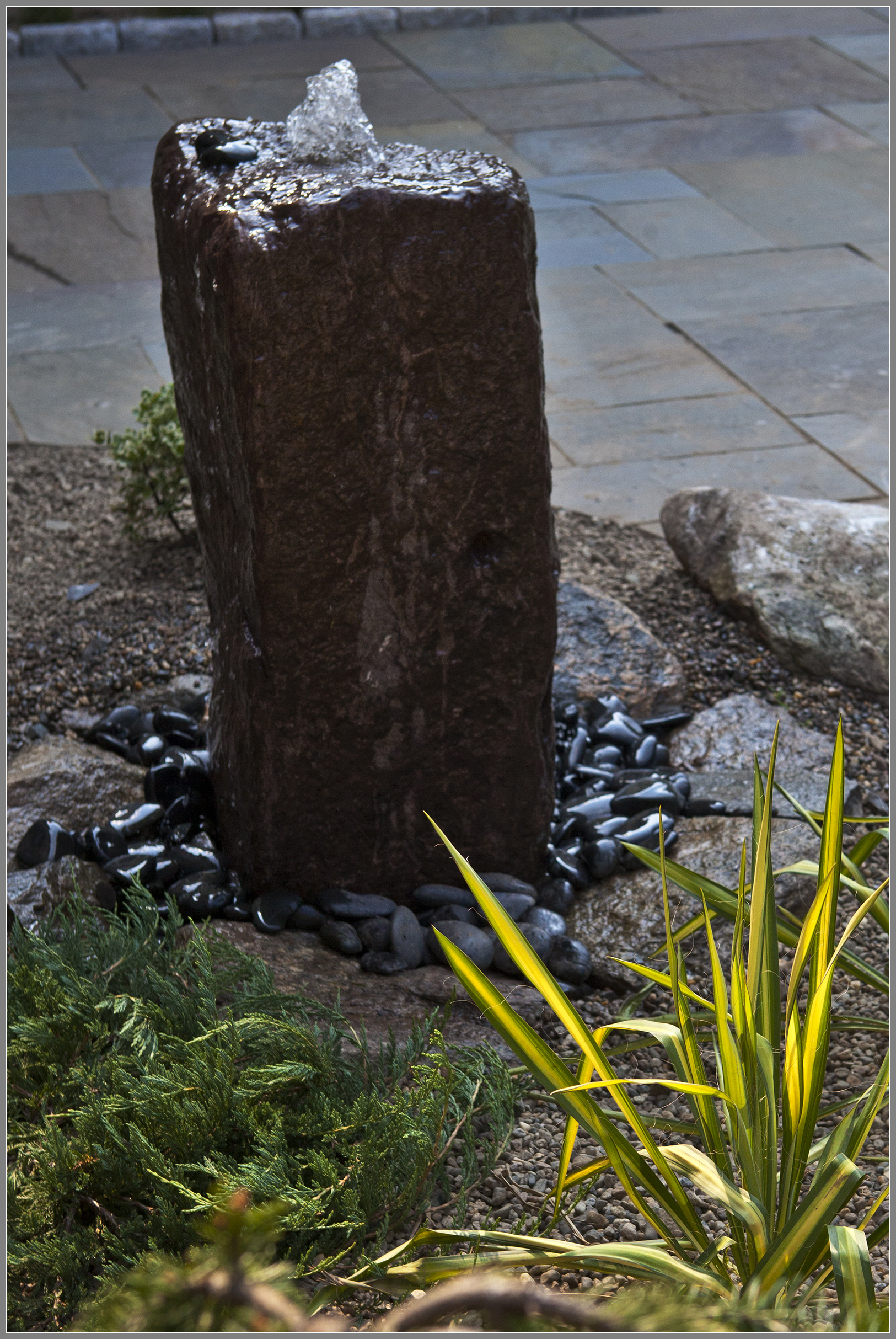 Natural stone water fountain by Artistic Outdoors