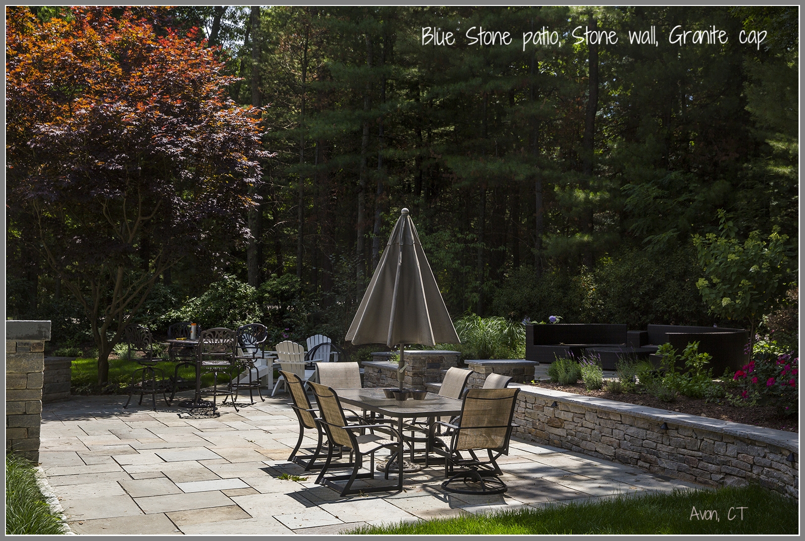 Blue stone patio and stone wall