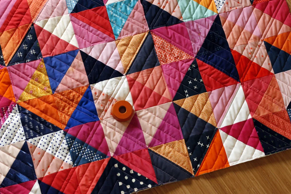 Modern Quilting for a Half Square Triangle quilt — Stitched in Color