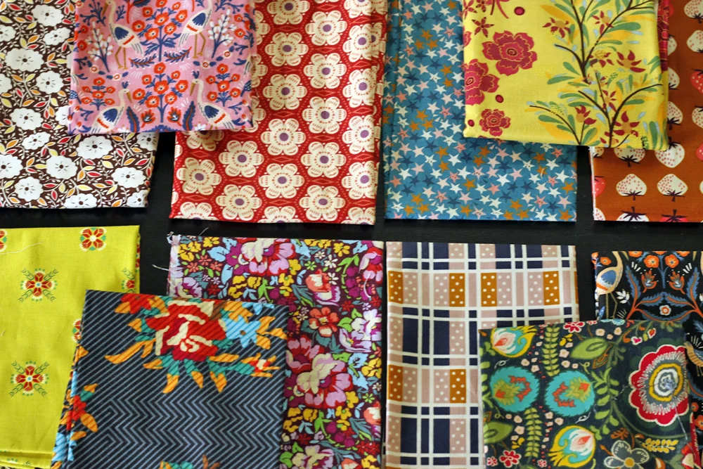 Random Multicolor Fabrics. Stitched in Color.jpg