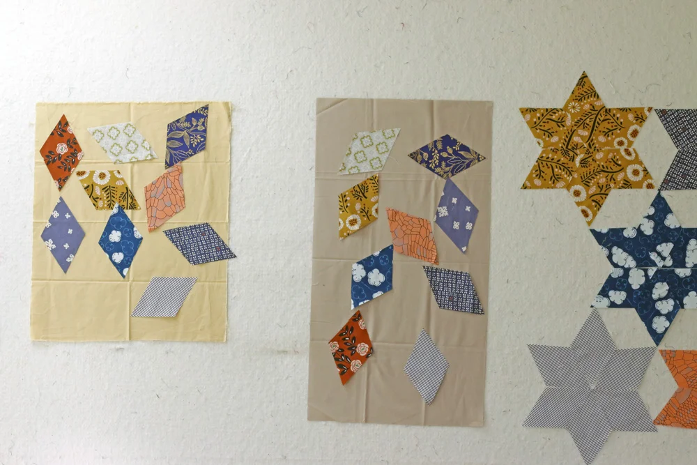 Auditioning Background Fabric. Stitched in Color.jpg