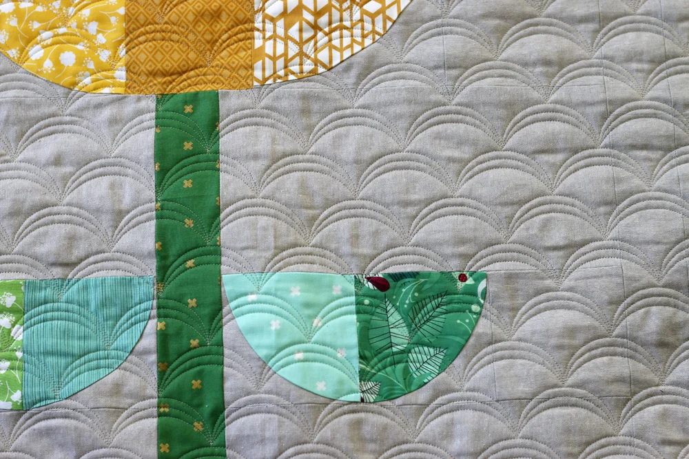 Triple Arc quilting. Stitched in Color.jpg