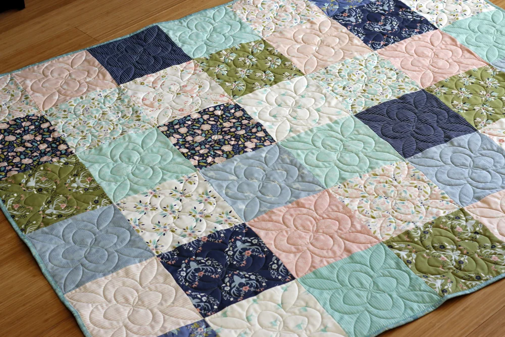 Layer Cake quilt. Stitched in Color.jpg