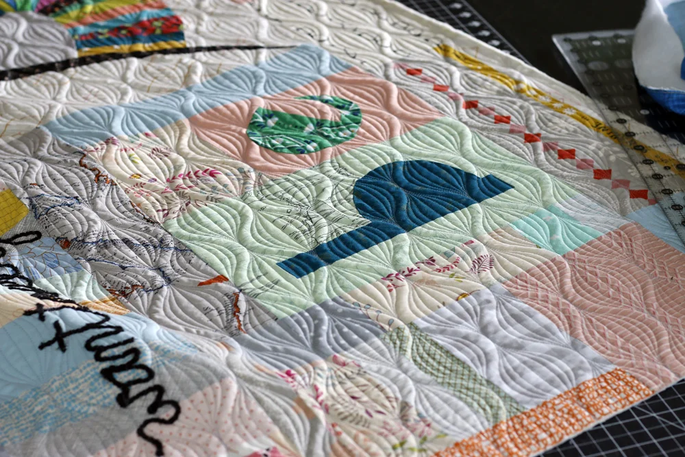 Squaring Improv Quilt. Stitched in Color.jpg