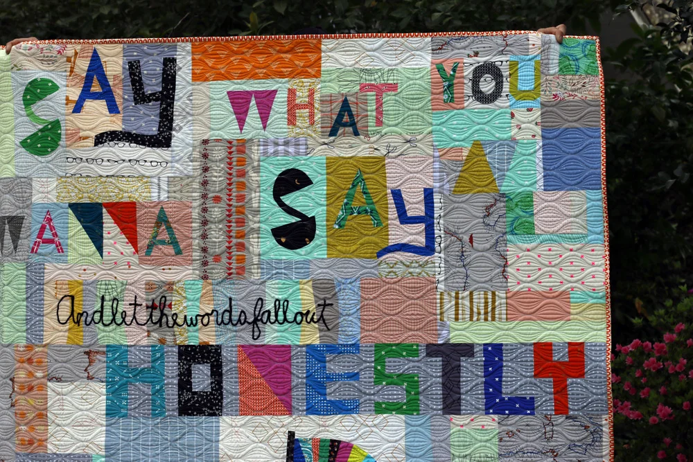 Improv word quilt. Stitched in Color.jpg