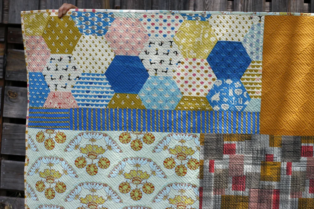 Scrappy quilt back. Stitched in Color.jpg