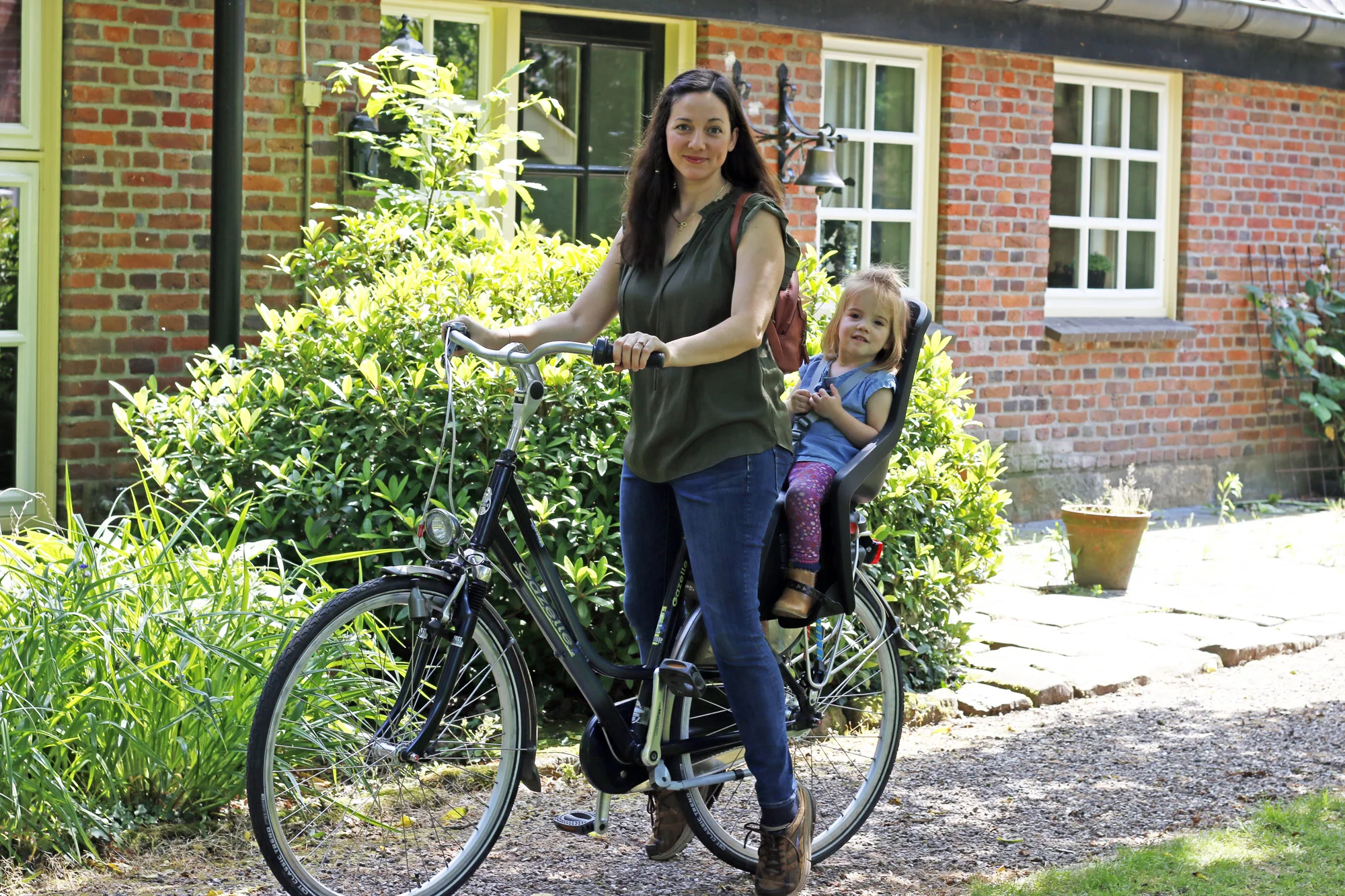 with Elora on bike.jpg