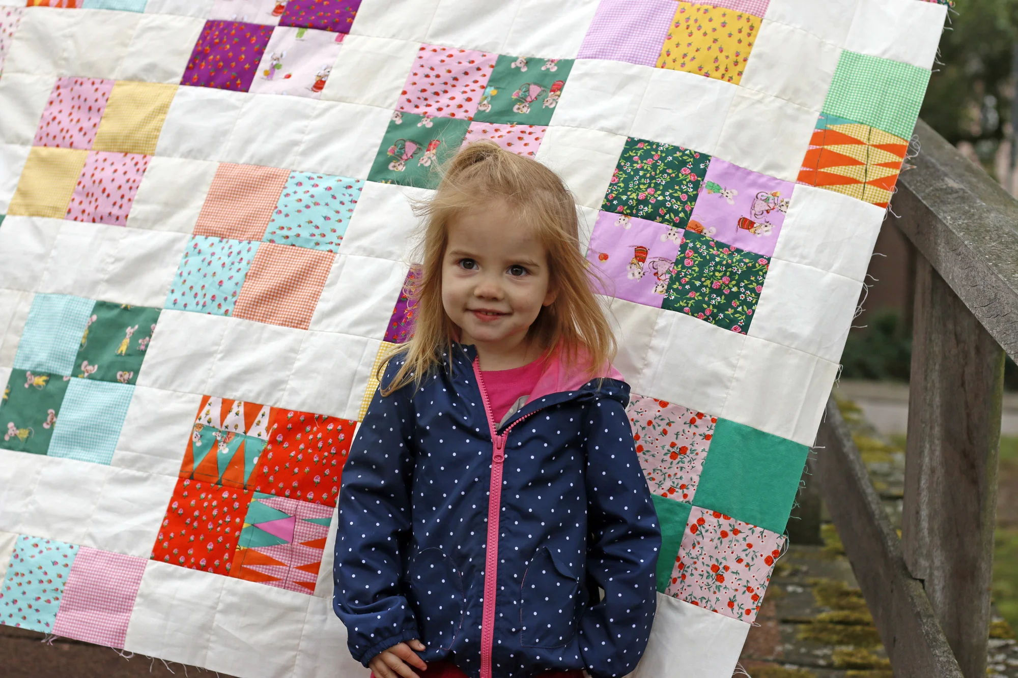 Elora and Trixie quilt. Stitched in Color.jpg