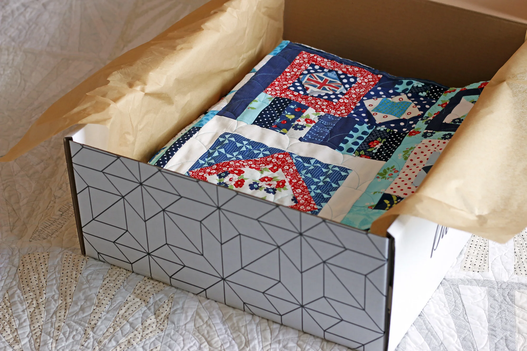 Quilt in box. Stitched in Color.jpg