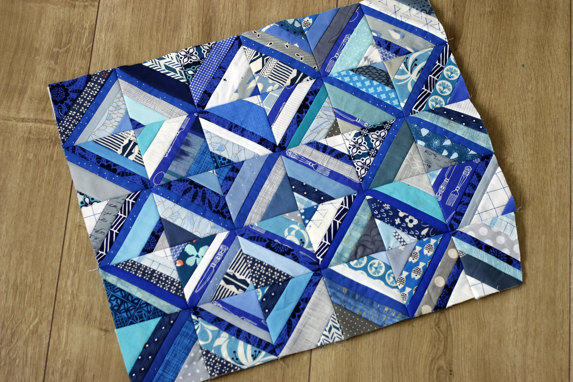 Blue string patchwork. Stitched in Color.jpg