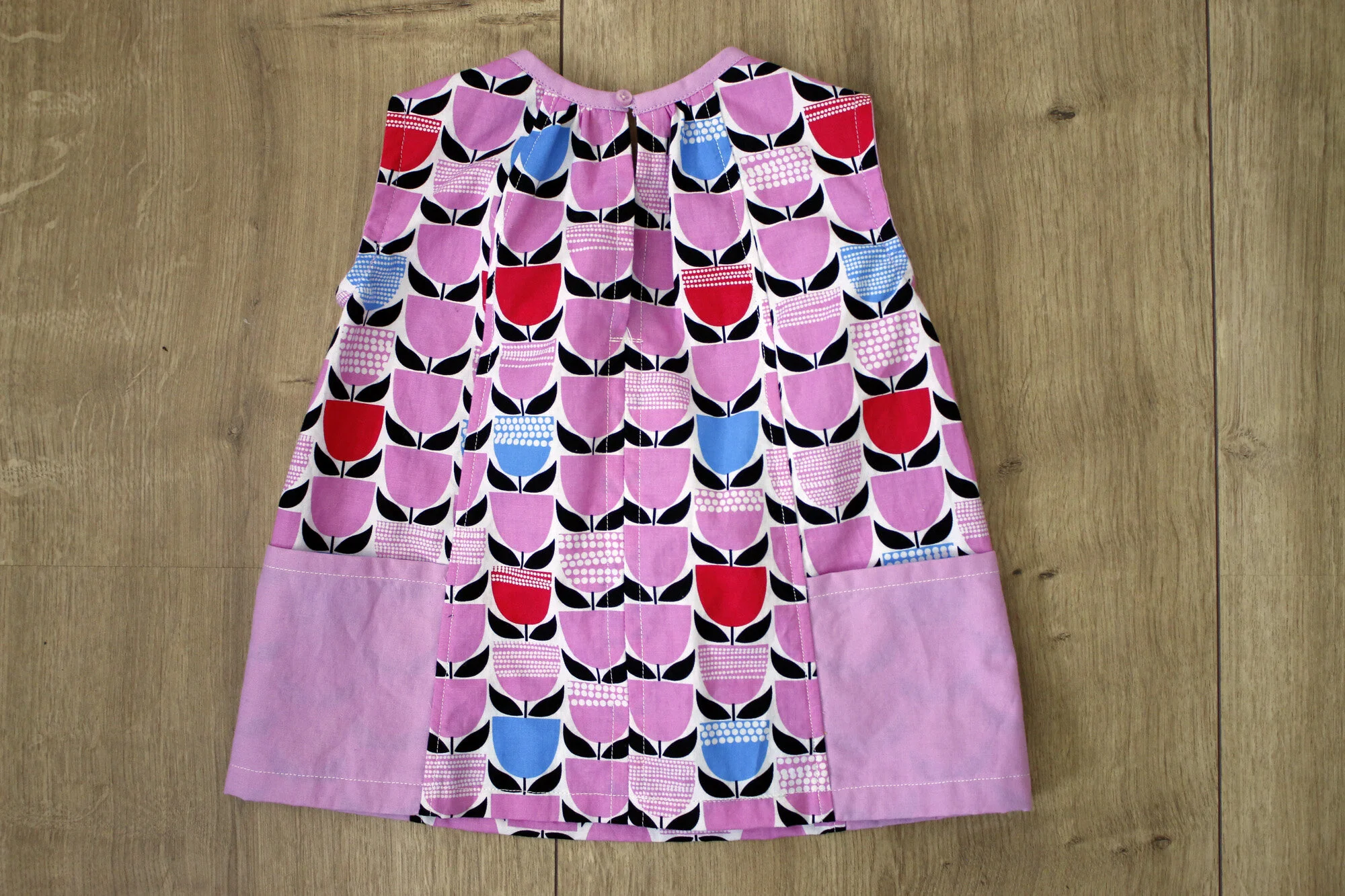 Wiksten Child Smock back tulips. Stitched in Color.jpg