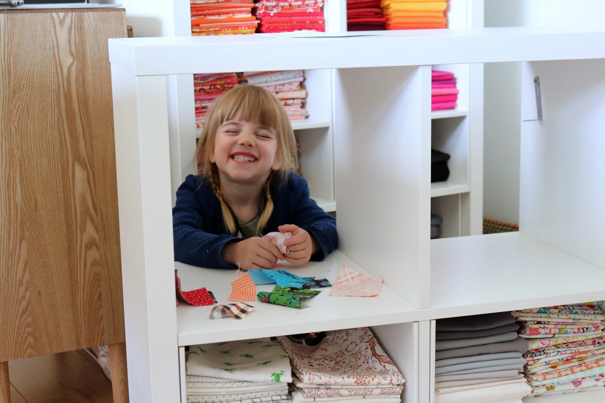 Elora's fabric shop 3. Stitched in Color.jpg