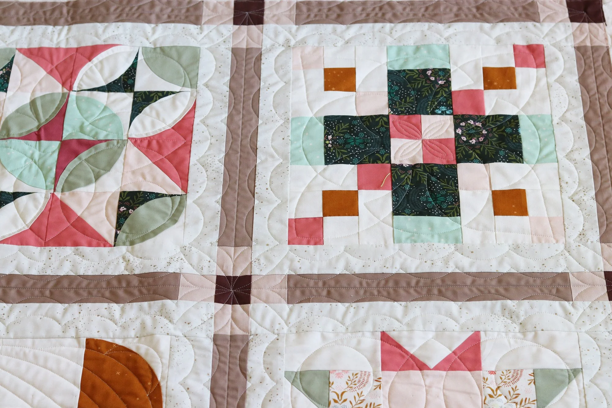 Longarm quilting sashing and cornerstones. Stitched in Color.jpg