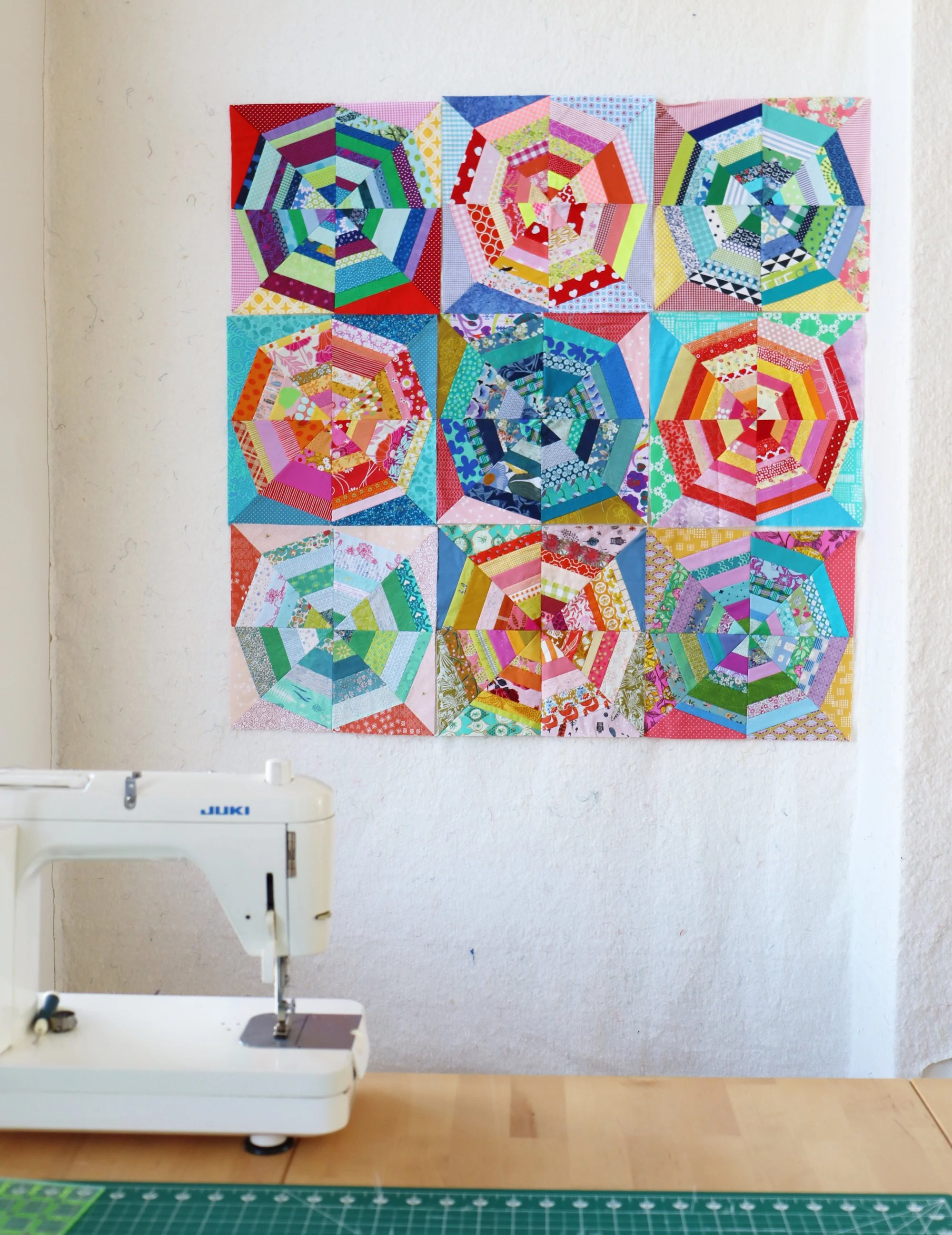 Their Spiderweb blocks. Stitched in Color.jpg