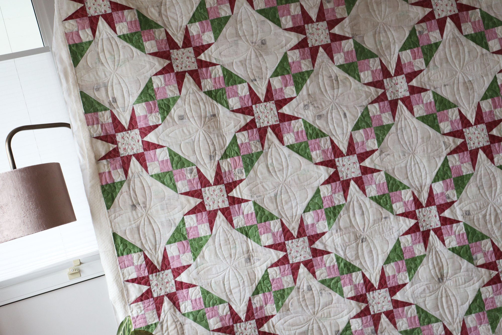 Custom quilted vintage quilt. Stitched in Color.jpg