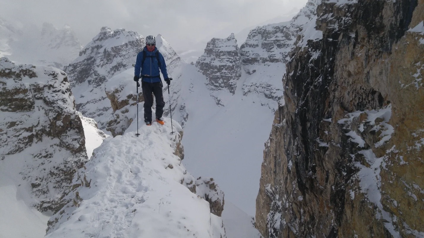 Martin posing for a pic before dropping into the couloir. The prominent face on the right also serves as a landmark for this couloir. Entrance is skiers right. 