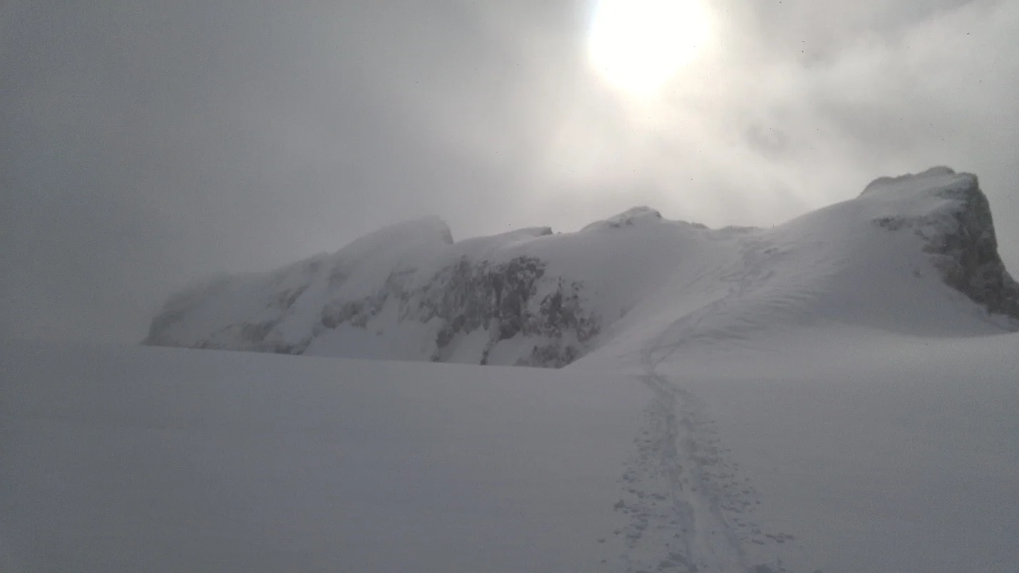 Quintessential Cathedral Mountain picture of the summit ridge. Stable snow is a must as a small slide would have big consequences (photo taken after our descent).