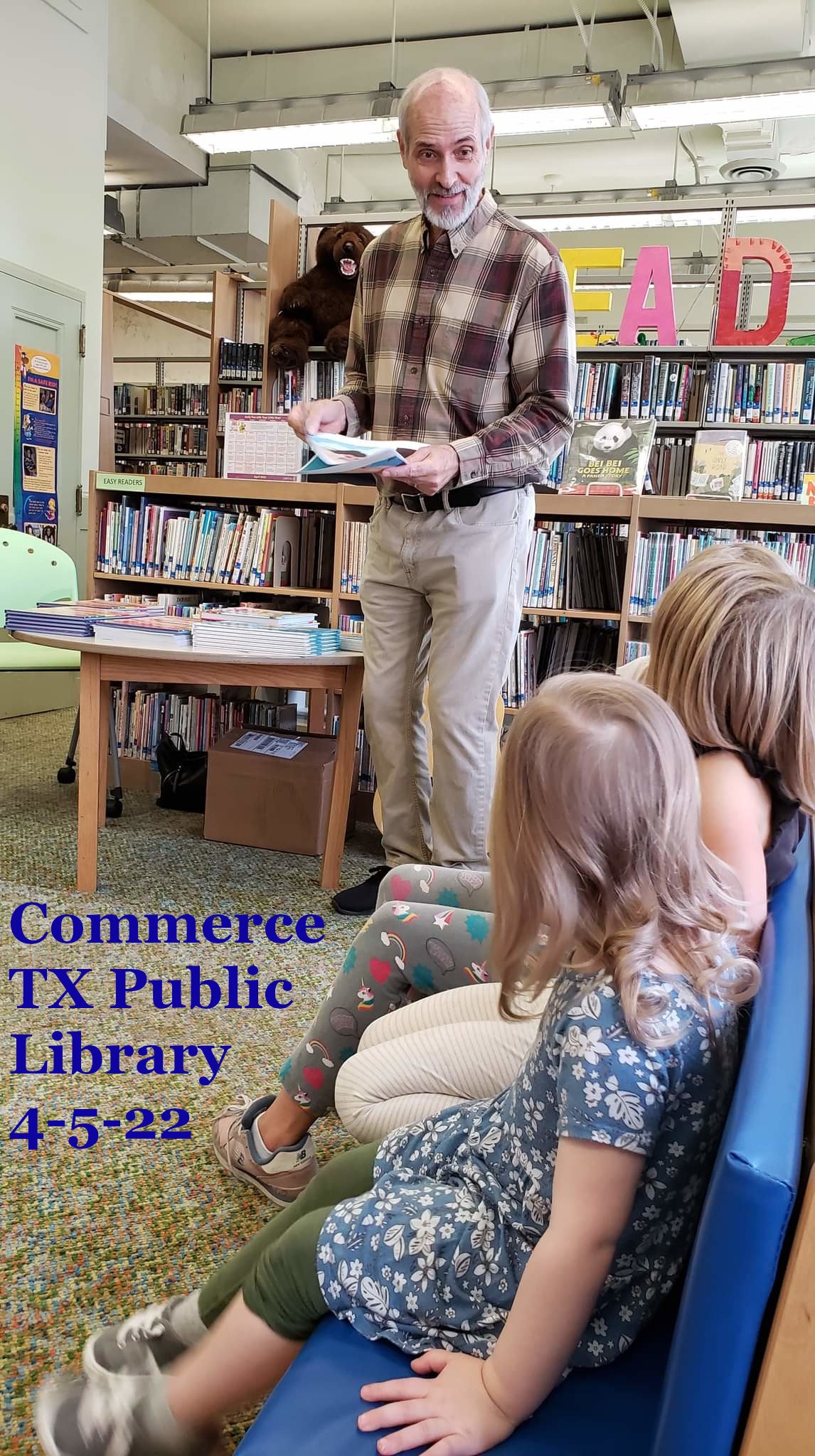 DC reading Tick Tock Tickle Bug at Commerce Public Library.jpeg