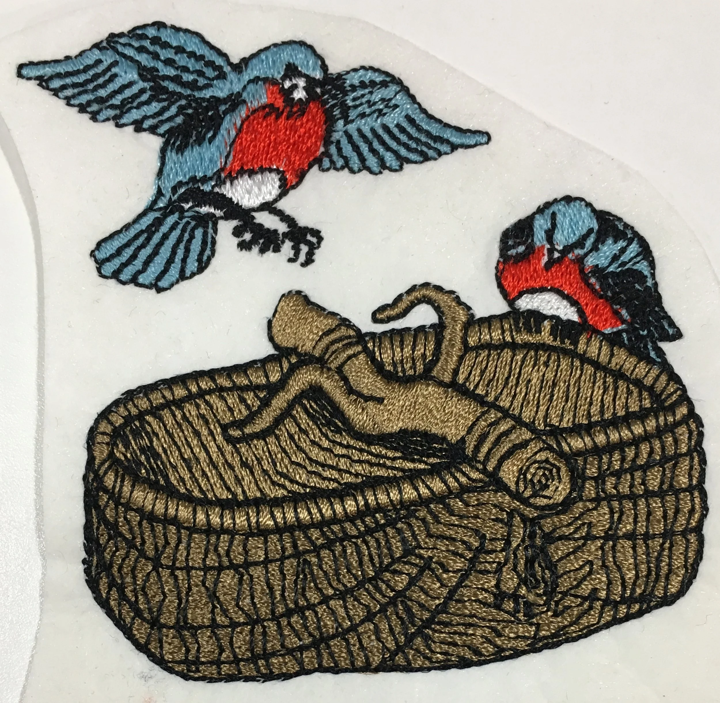 5-color embroidery on cut away backing