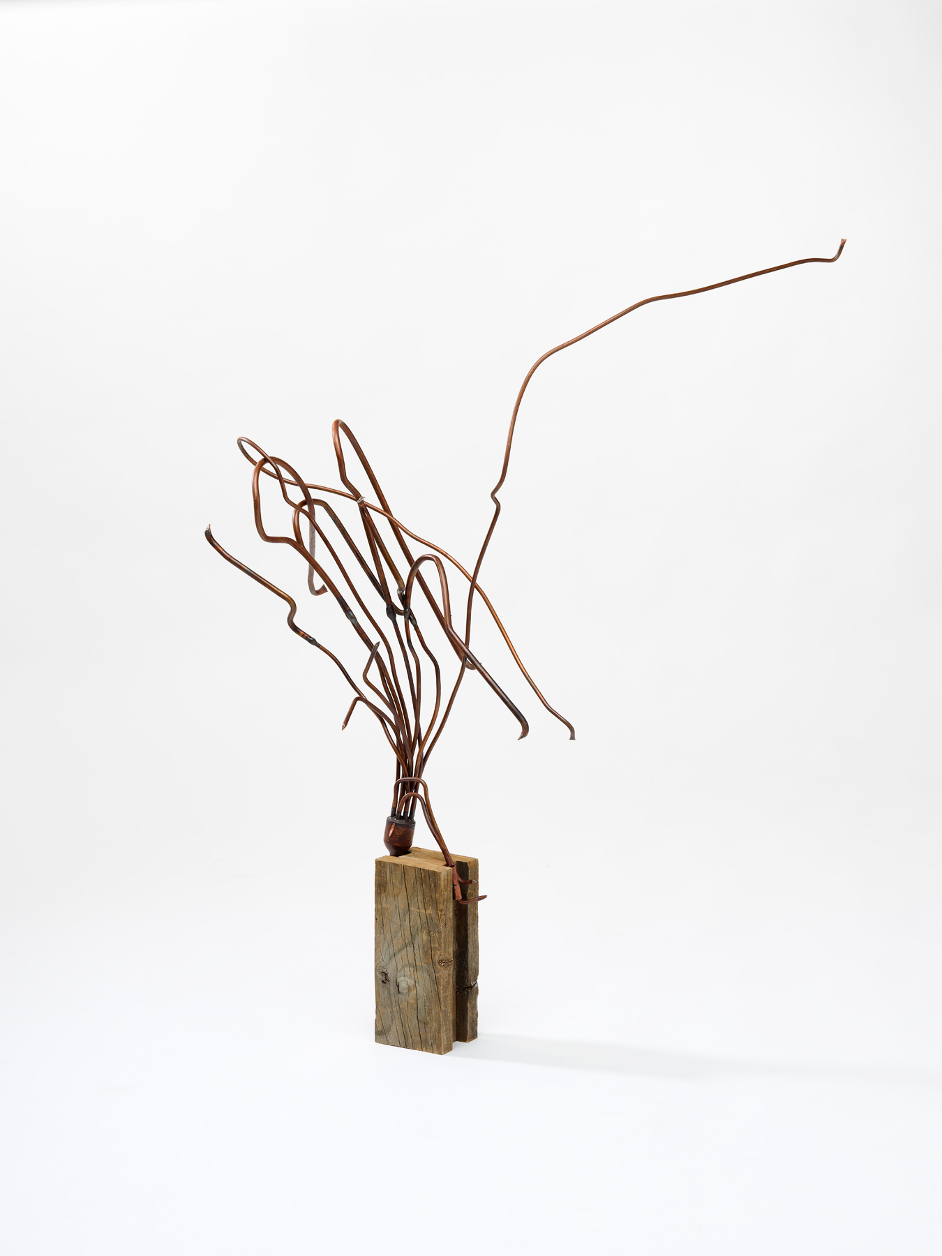   Flux,  2018  copper piping and wood block  97 x 62 x 45 cm  Photograph Grant Hancock 