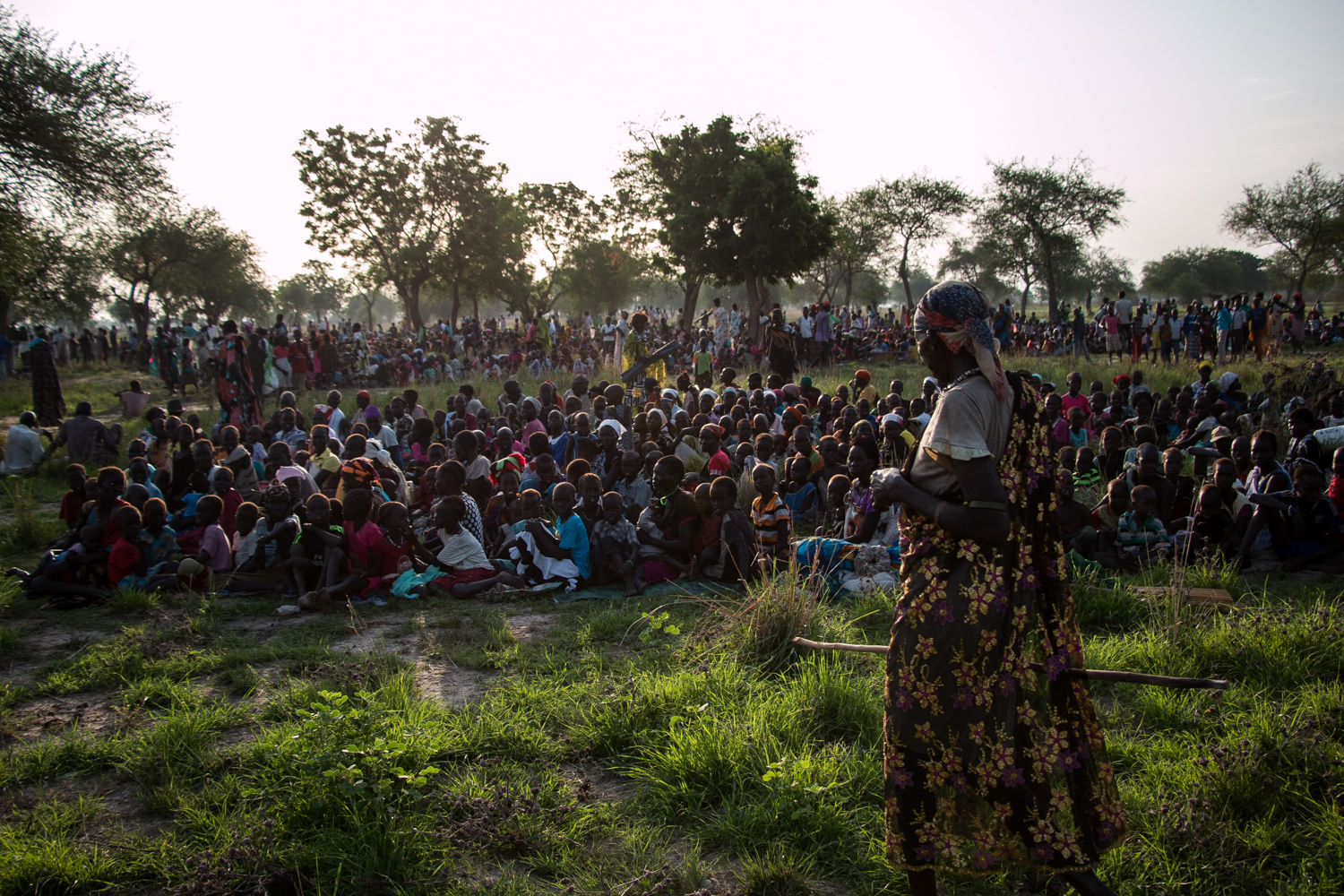 Up to 8,000 civilians await a food distribution in the remote bush in South Sudan's Unity state. 