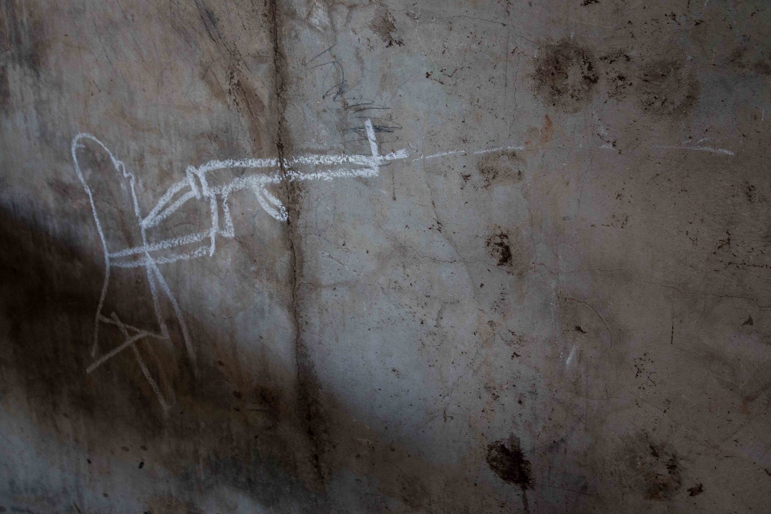 Graffiti on the walls of an abandoned school in northern Unity state, South Sudan.