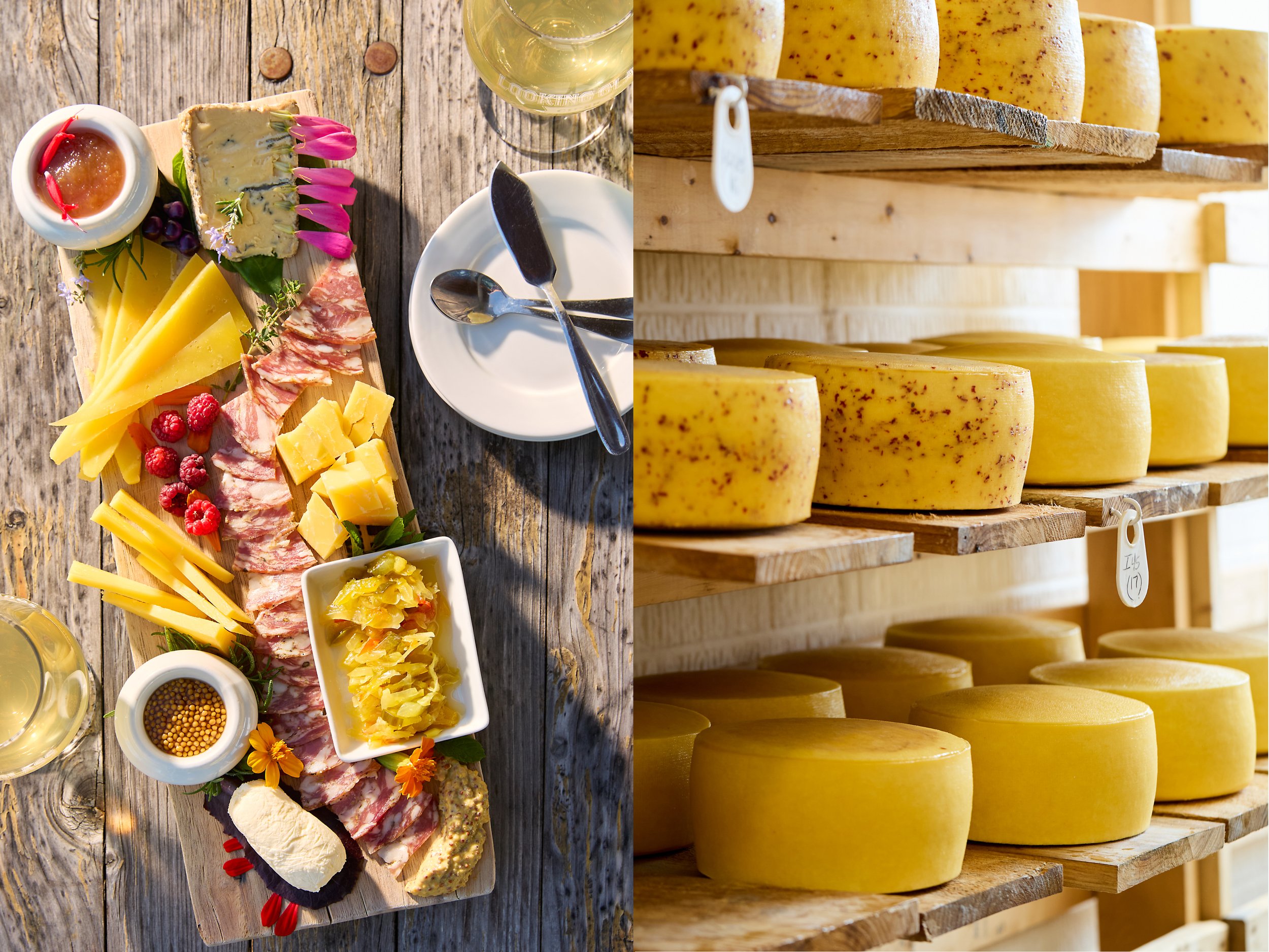 Diptych: Left, a beautiful charcuterie board by Looking Glass Creamery on a wooden table with white wine. It contains various cheese, honey, mustard, flower petals, fruit. Right, rows of yellow cheese wheels. Photos by Stacey Van Berkel.