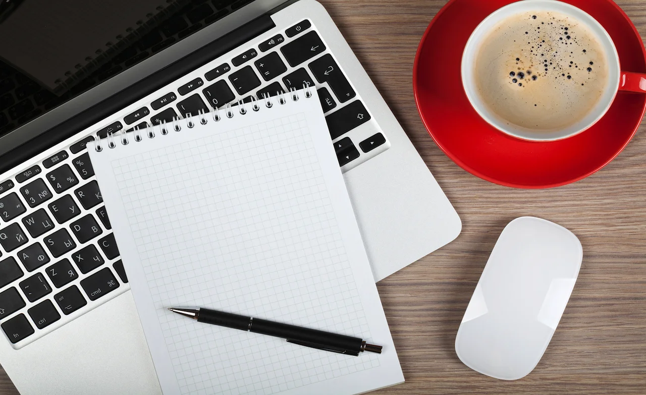 bigstock-Blank-notepad-over-laptop-and-51253441.jpg