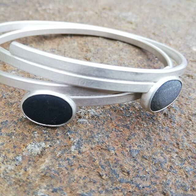 A couple of bangles on offer for #artistssupportpledge today. Silver with an orkney pebble. These bangles are oval, the one in image 3 measures 66mm inside at widest and the pebble is 15x11mm. The bangle in image 4 measures 64mm inside at widest poin