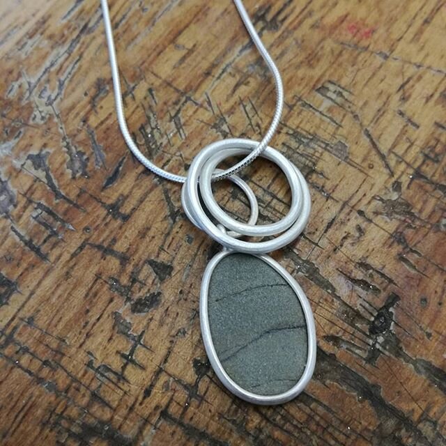 *sold* A pendant for the #artistssupportpledge today. A little Orkney pebble set in silver with a silver coil on snake chain. Chain length can be 16, 18 or 20''. Length of pendant (top of little hoop to bottom of pebble setting) 30mm. &pound;90 + &po