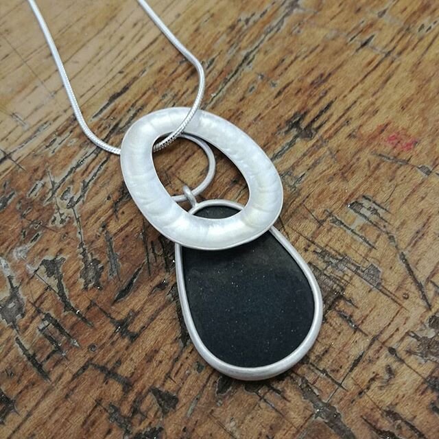 *sold* Another pendant for today's #artistssupportpledge. A pebble in silver with a textured silver hoop on a snake chain. The pendant measures 35mm drop (from top of small hoop to bottom of pebble) and available on 16,18 or 20'' chain. &pound;120 + 