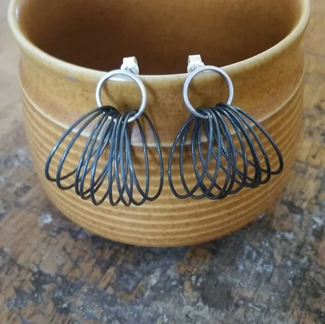 Some earrings for the#artistssupportpledge today. Multi coil earrings in silver and oxidised silver. There are two options, swipe to see, silver hoop at top(available) or oxidised hoop at top(*sold*). 30mm drop. &pound;80 + &pound;7 p&amp;p. DM me if